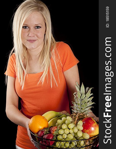 Woman in orange with fruit basket