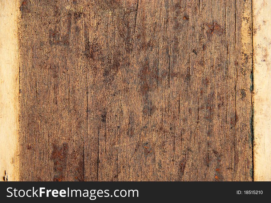 Old grunge scratched wood background. Old grunge scratched wood background