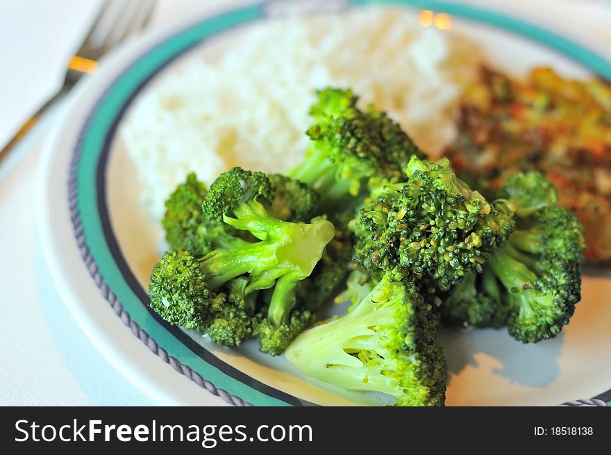 Vegetable rice set of white rice and healthy broccoli delicacy.