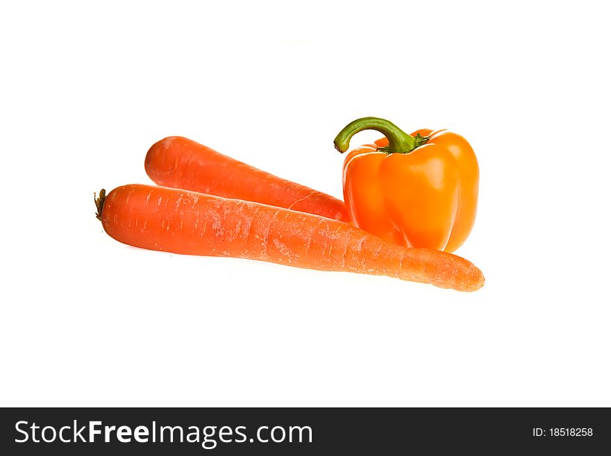 Paprika and carrot isolated on white