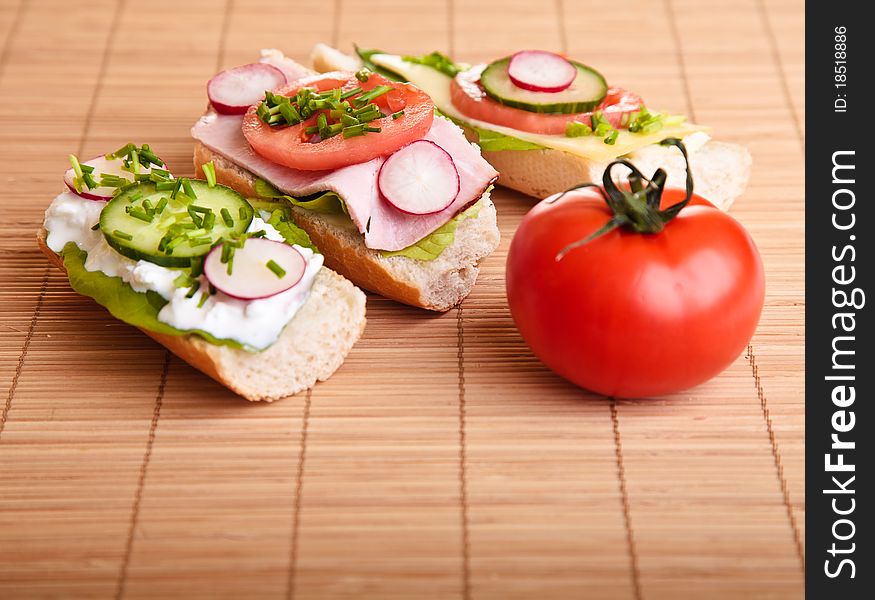 Different sandwiches with vegetables and cheese isolated