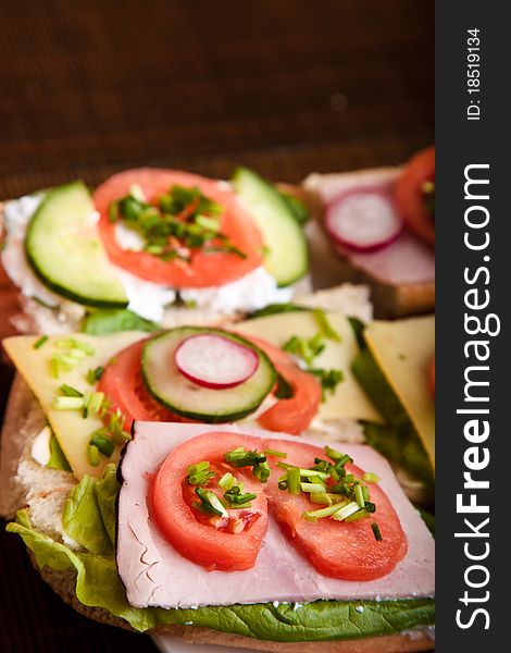 Different sandwiches with vegetables and cheese isolated