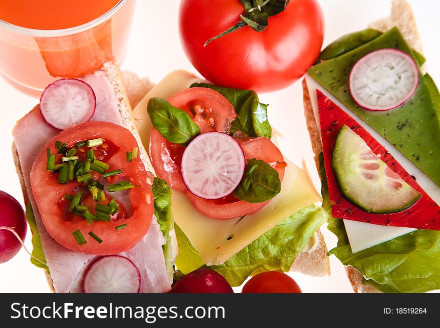 Different sandwiches with vegetables and cheese isolated