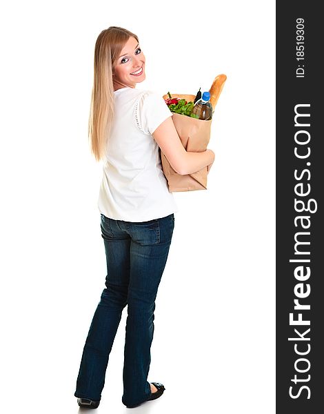 Woman Carrying Bag Of Groceries