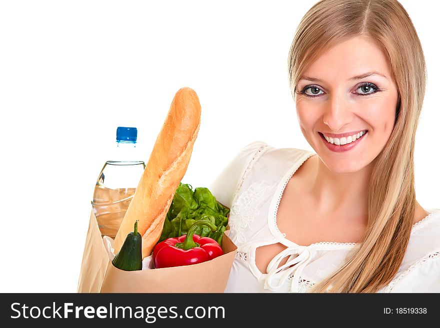 Woman carrying bag of groceries