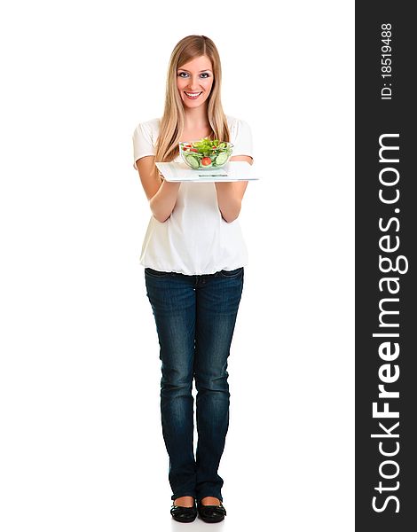 Woman with salad and scales isolated on white