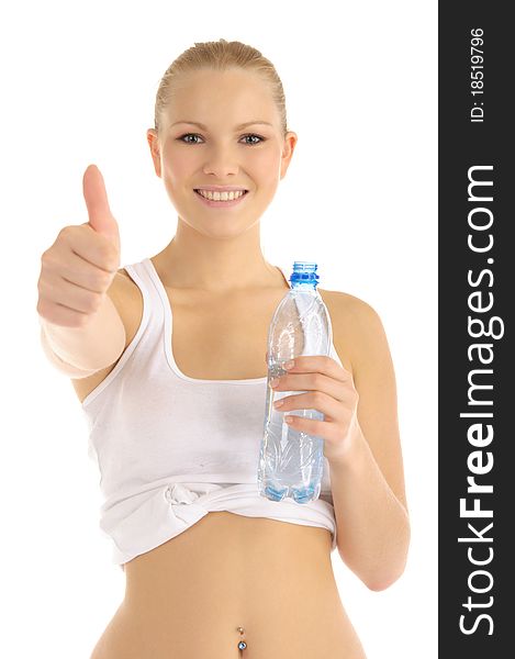 Contented woman holding a water bottle isolated on white