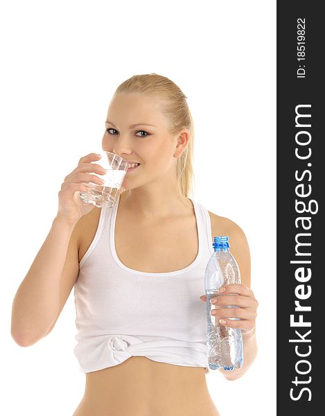 Happy woman drinks water from a glass isolated on white