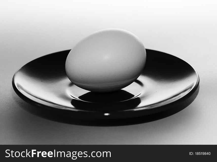 Egg on the plate,black and white