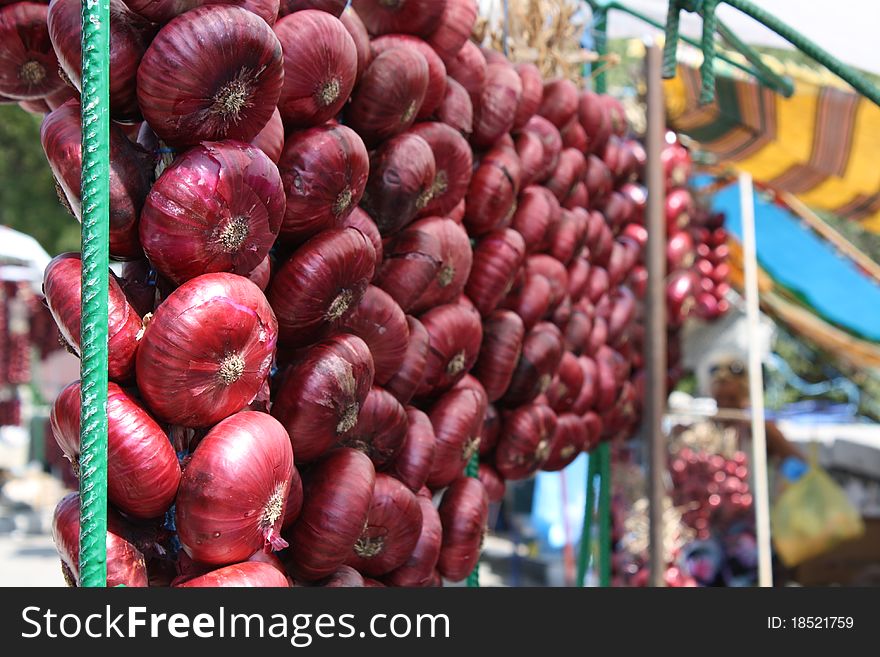 Vegetables - red onion on a market