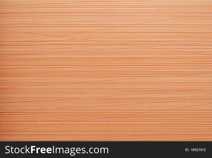 Background of red and beige horizontal stripes.