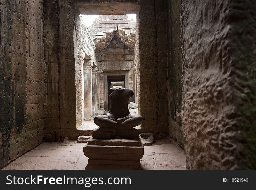 A headless statue decorates the interiors of Preah Khan in the Angkor complex at Siem Reap, Cambodia. A headless statue decorates the interiors of Preah Khan in the Angkor complex at Siem Reap, Cambodia.