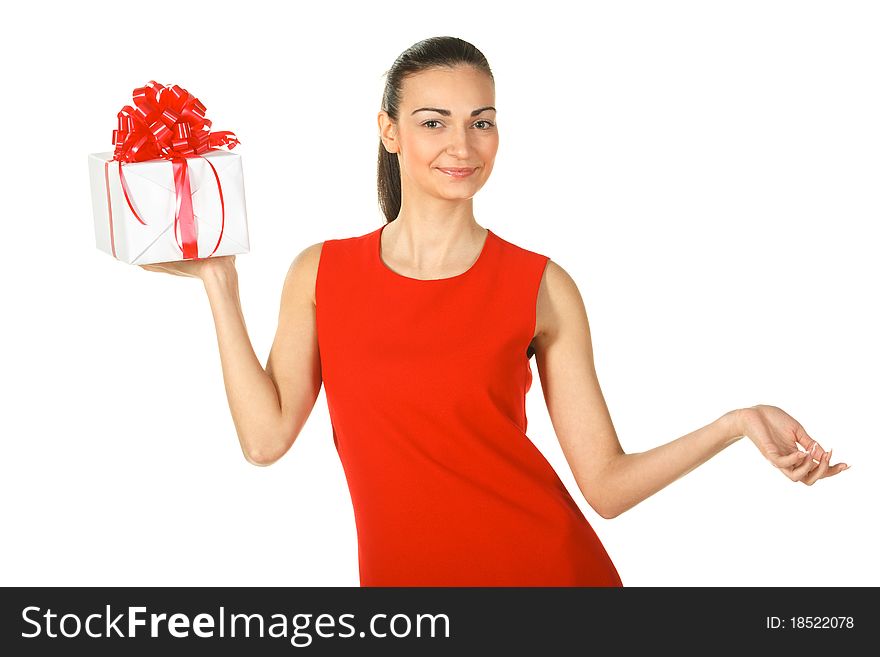 Young elegant female in red pencil-dress holding present box isolated on white. Young elegant female in red pencil-dress holding present box isolated on white