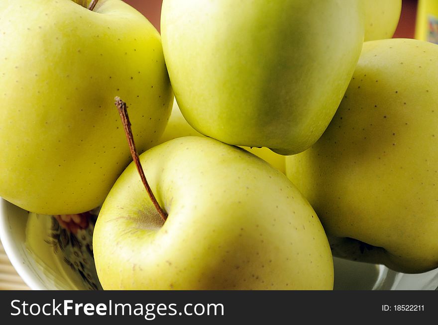 Few juicy apples on a white background