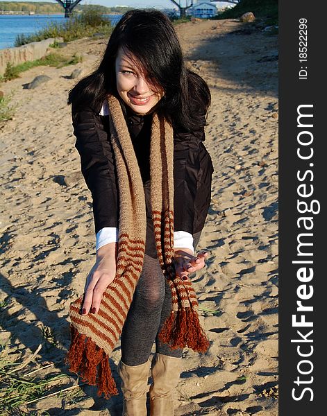 Portrait of young happy woman, standing  outdoor