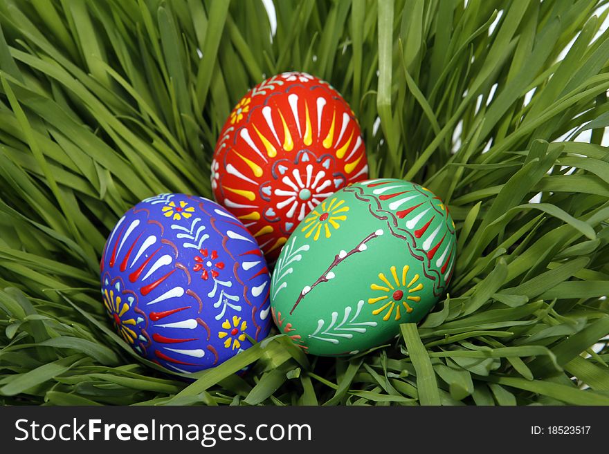The Easter painted eggs on the grass. The Easter painted eggs on the grass
