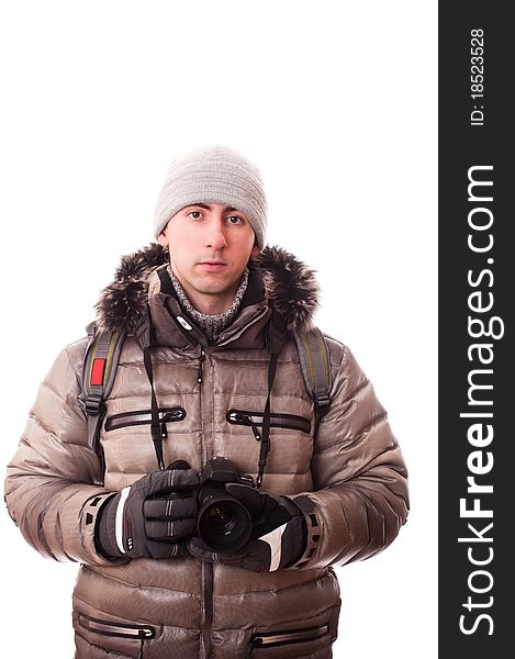 Traveller in winter clothes with camera(isolated on white). Traveller in winter clothes with camera(isolated on white)