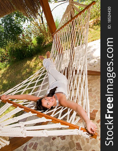 Young woman in hammock