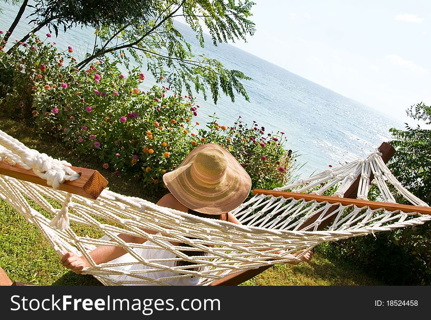 Young beautiful woman in hammock. Young beautiful woman in hammock