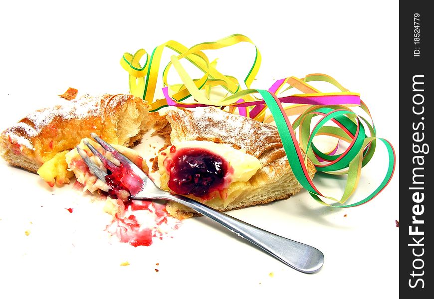 A messy scene of pastry cake left overs with fork