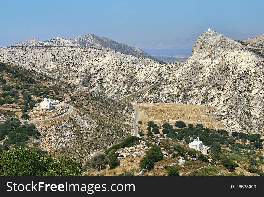 Three Greek mountain churches in same valley landscape. Three Greek mountain churches in same valley landscape