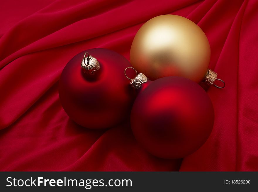 Christmas balls on silk background
