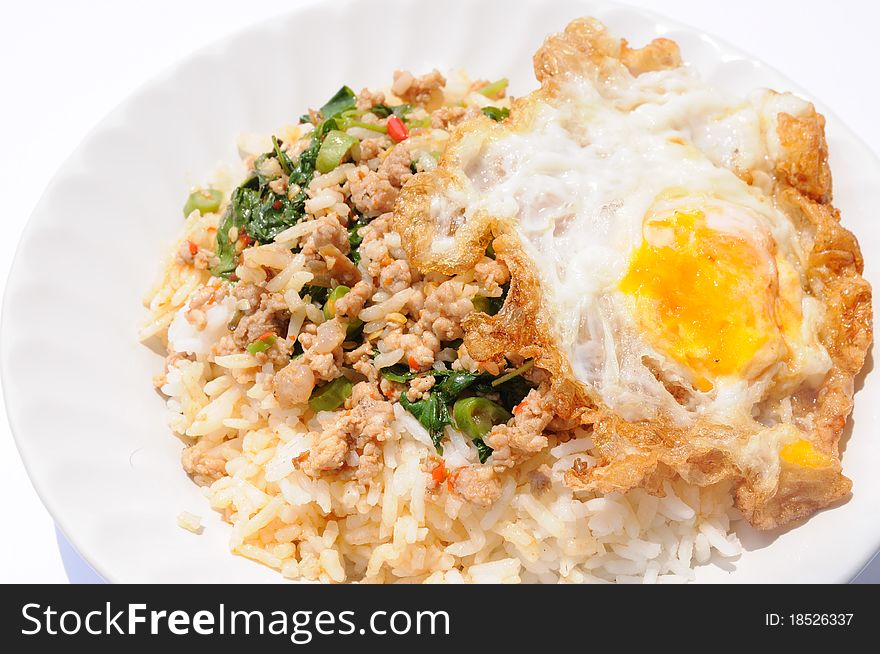 Power fried pork chop with egg on rice. Power fried pork chop with egg on rice.