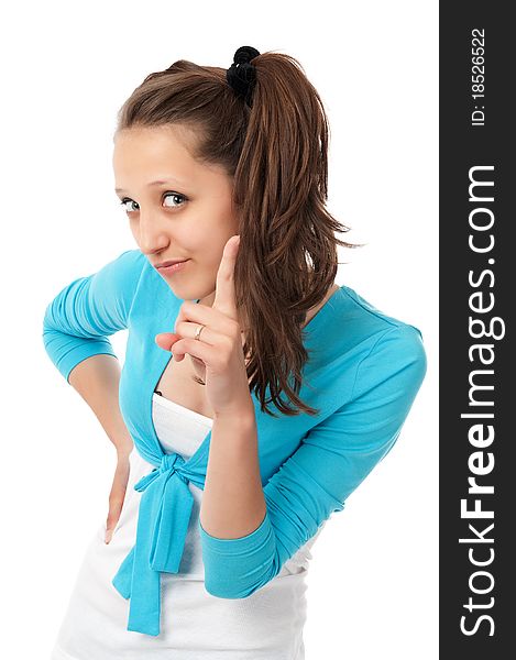 Attractive teenage girl with her finger up