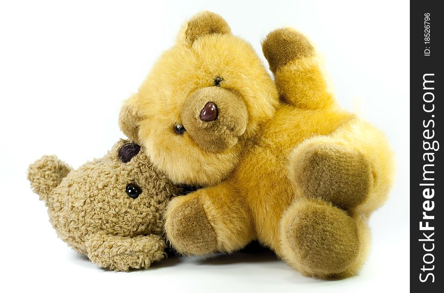 Two teddy bears on a white background.