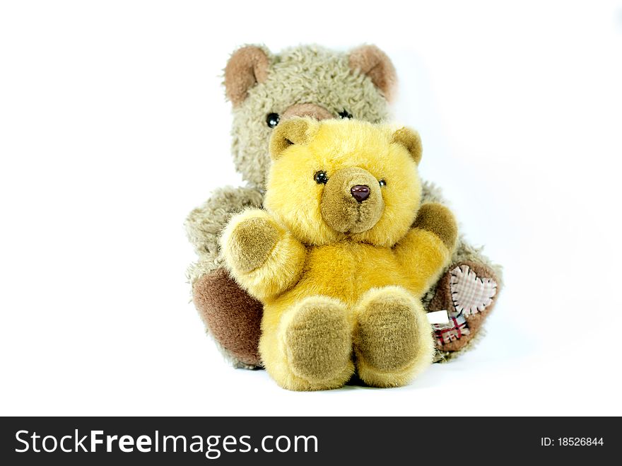 Two teddy bears on a white background.