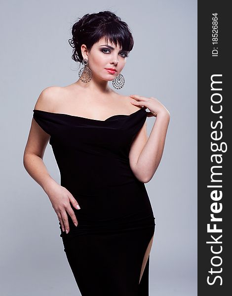 Portrait of a gorgeous woman in black dress