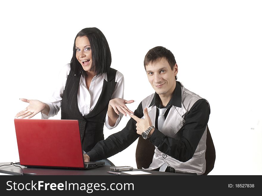 Two business people sitting with notebook. Two business people sitting with notebook