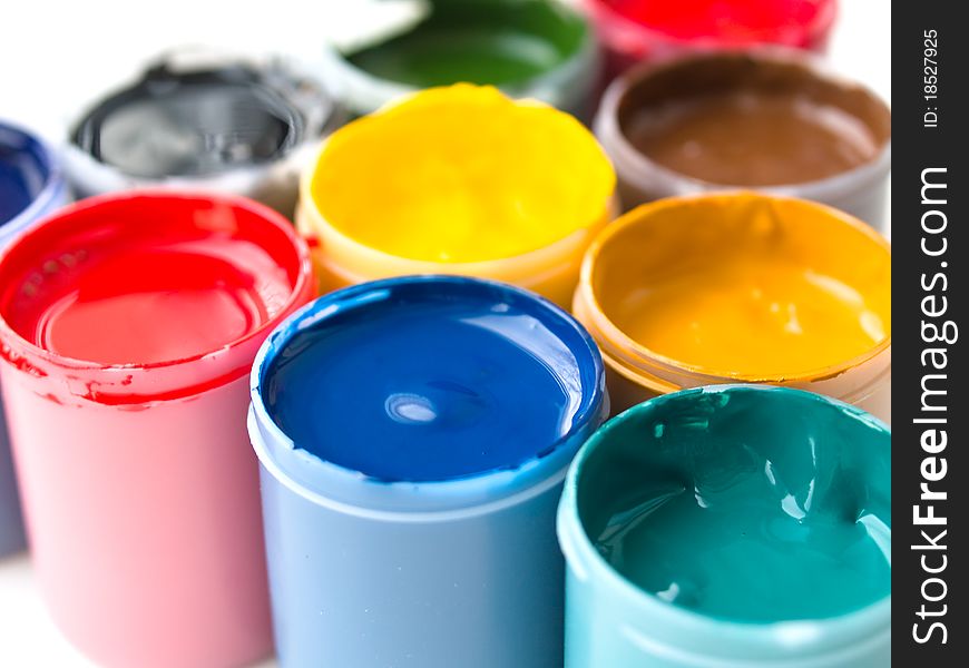 Gouache paints in plastic buckets