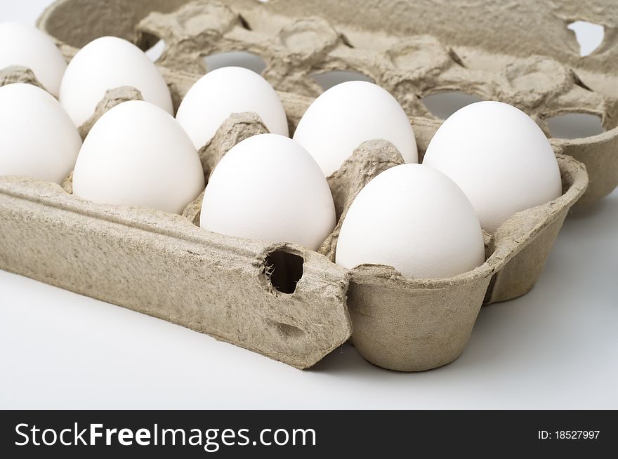 White chicken eggs in the paper box. White chicken eggs in the paper box