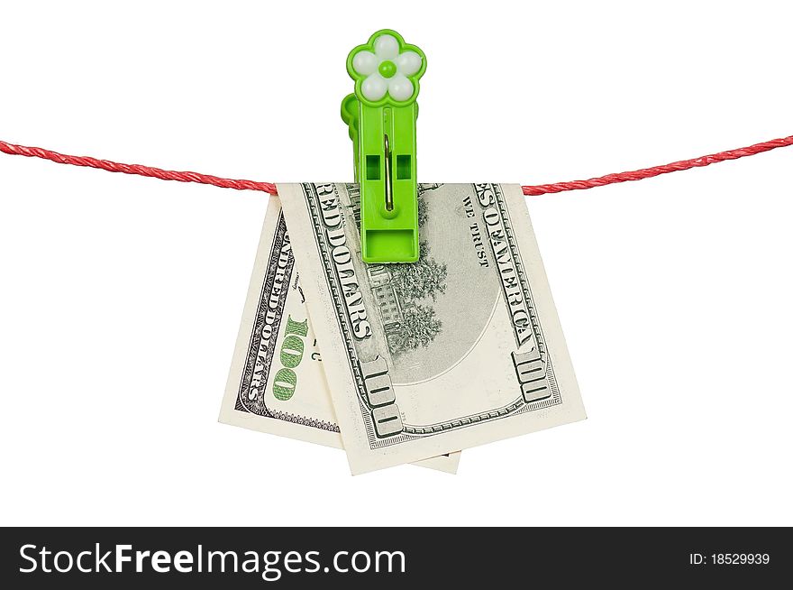 One hundred dollar bill hanging on a clothesline isolated on white background. One hundred dollar bill hanging on a clothesline isolated on white background