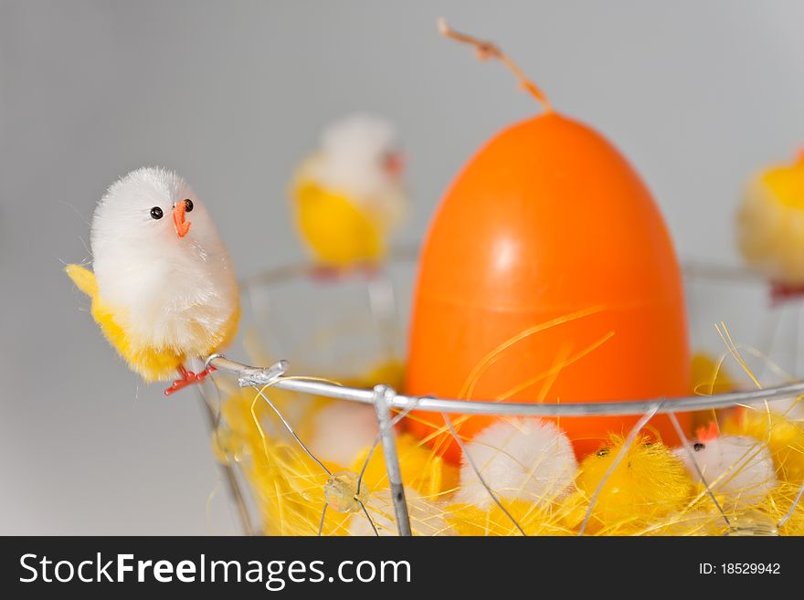 White and Yellow Easter chick with orange egg
