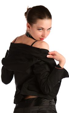 Girl In Black Suit Demonstrate Her Shoulders. Royalty Free Stock Photos