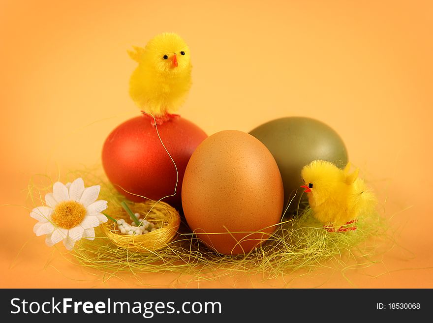 Easter chicken with colored eggs. Easter chicken with colored eggs