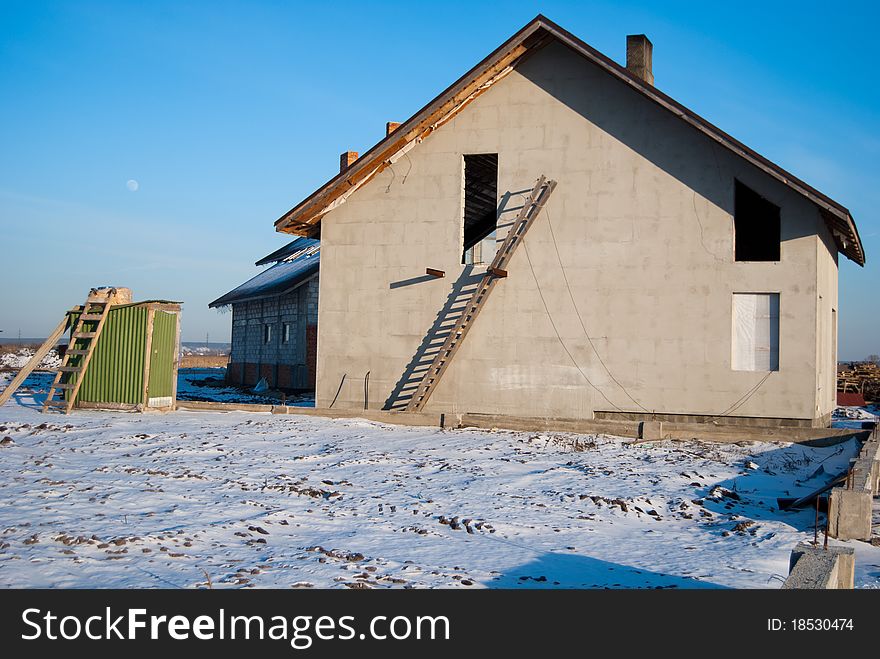 Construction of residential house in winter. Construction of residential house in winter