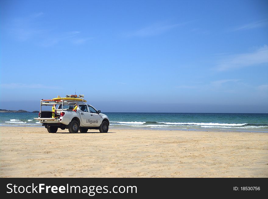 Lifeguards rescue vehicle situated on a beach in cornwall during the summer. Lifeguards rescue vehicle situated on a beach in cornwall during the summer