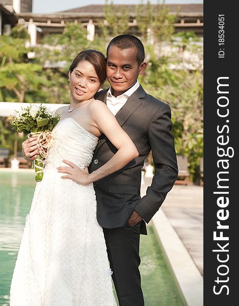 Asian Wedding Couple In Tropical Location