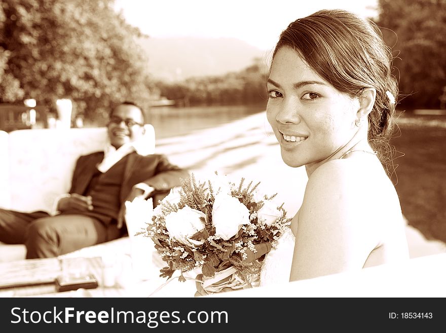 Asian wedding couple in tropical location