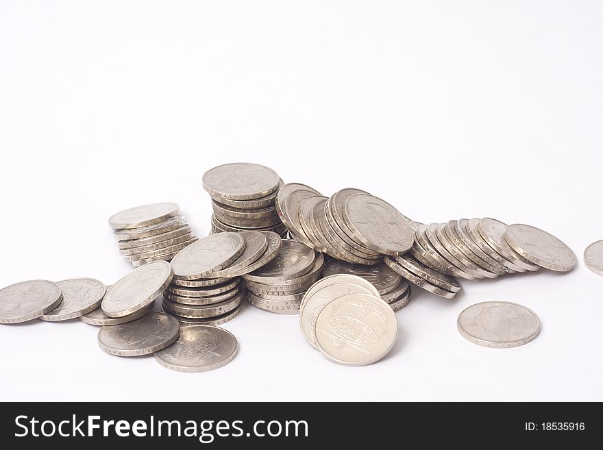Heap of coin isolated white background