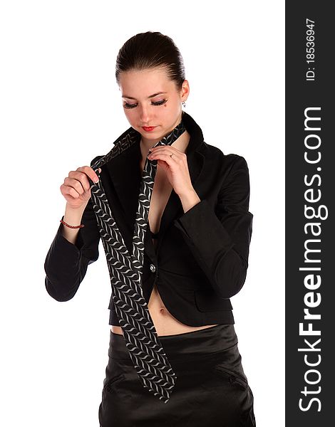 Girl In Black Suit Makes Necktie.