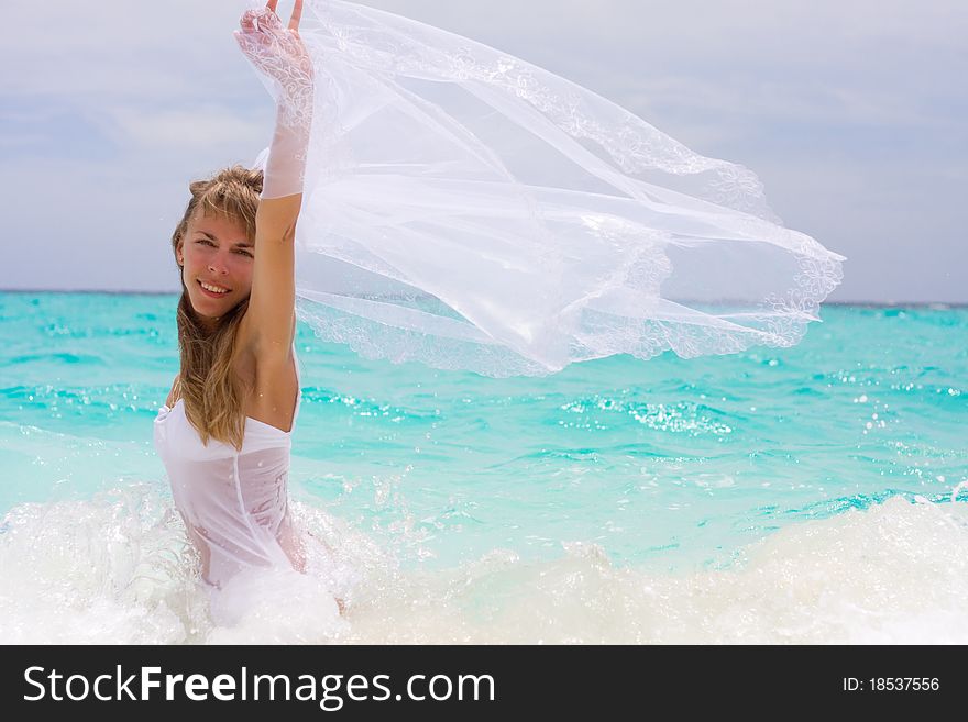 Bride on a coastline at tropical beach. Bride on a coastline at tropical beach