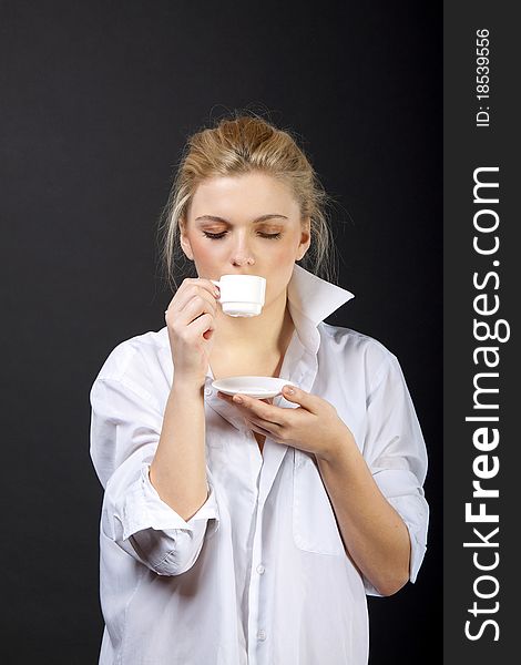 Beautiful Woman Drinking Coffee, sensual blond in man's shirt. Beautiful Woman Drinking Coffee, sensual blond in man's shirt