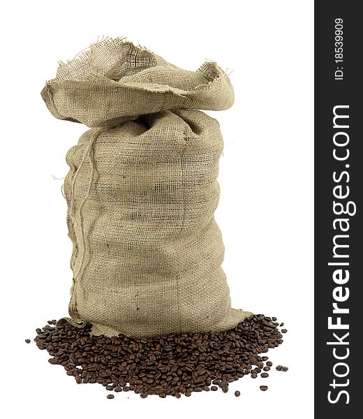 Coffee beans around a hessian bag isolated on white