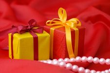 Box With A Gift On A Red Fabric Royalty Free Stock Image Box With A Gift On A Red Fabric Royalty Free Stock Image