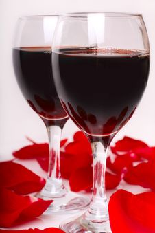 Two Glasses Of Wine With Petals Of Rose Royalty Free Stock Photography Two Glasses Of Wine With Petals Of Rose Royalty Free Stock Photography