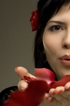 Beautiful Passionate Woman Kisses Red Petals Stock Photo